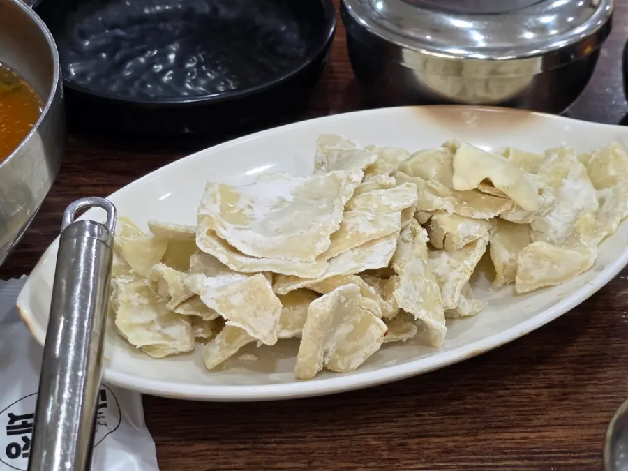 Hand-pulled dough soup dumplings added to the hot pot