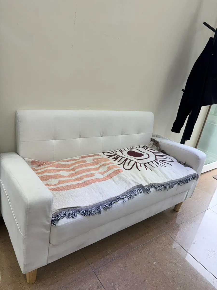 Pedicure area with a sofa