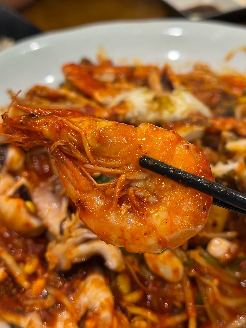Seafood stew ingredients pre-prepped by staff