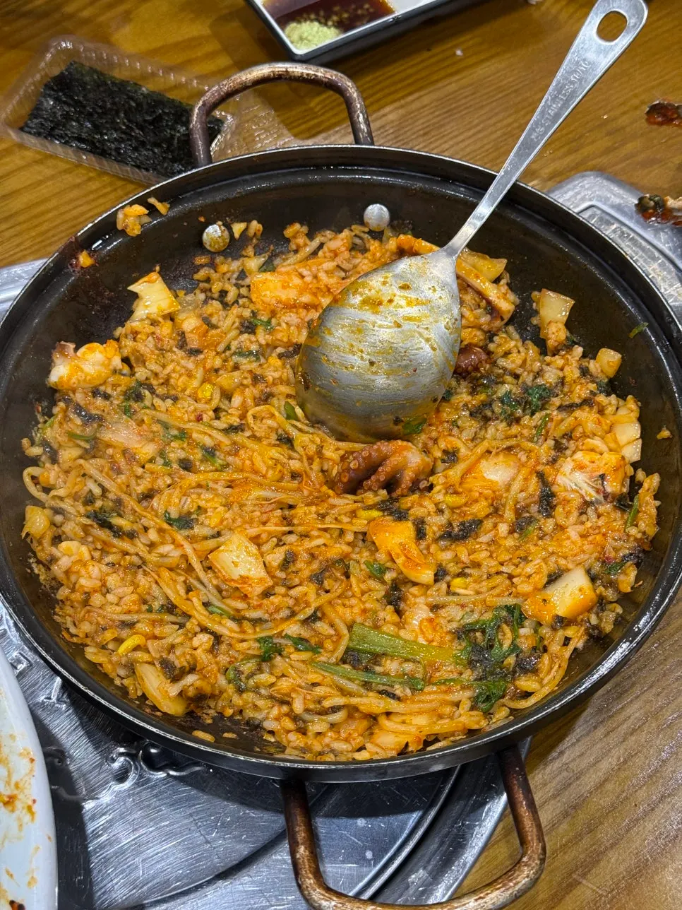 Seafood stew cut into bite-sized pieces