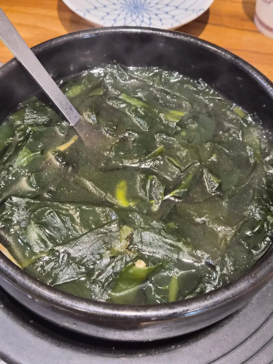 Seaweed soup and gim served as banchan