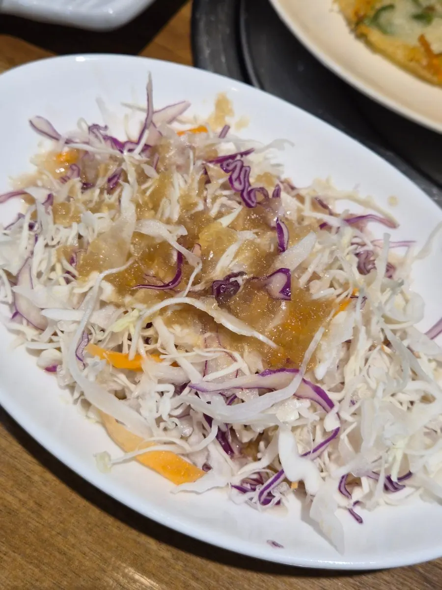 Generously laid-out basic side dishes at the sashimi restaurant