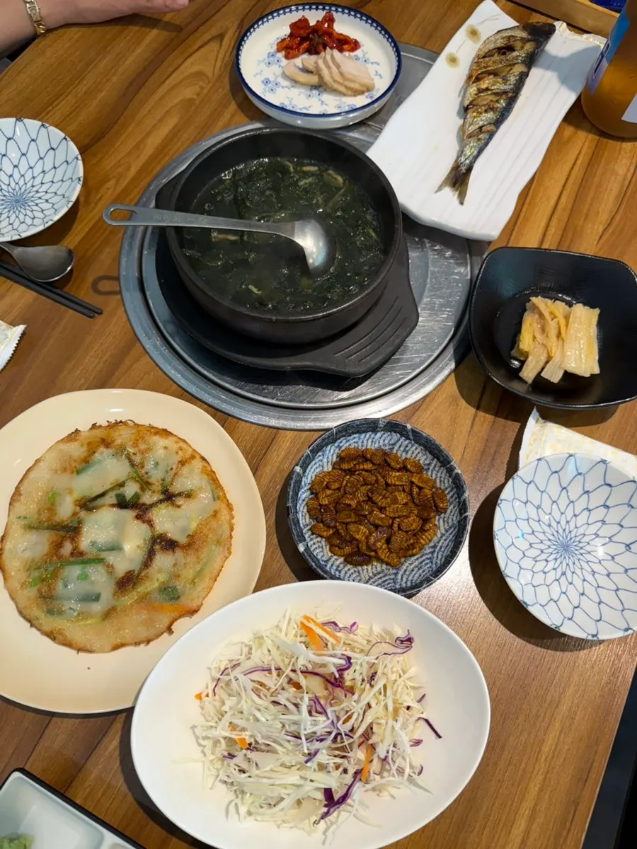 Crispy jeon, boiled pork and other side dishes