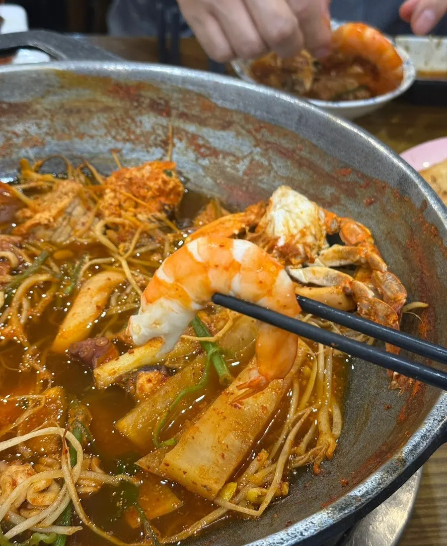 Seafood pulled out of the stew pot