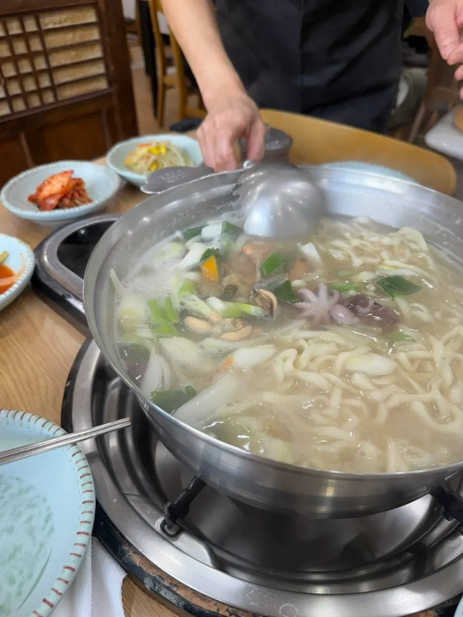 Seafood kalguksu with seafood and house-made noodles