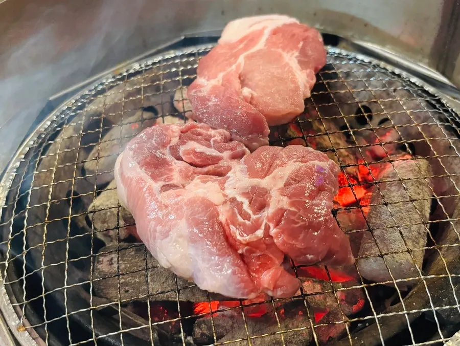 Family dinner table with grilled meat