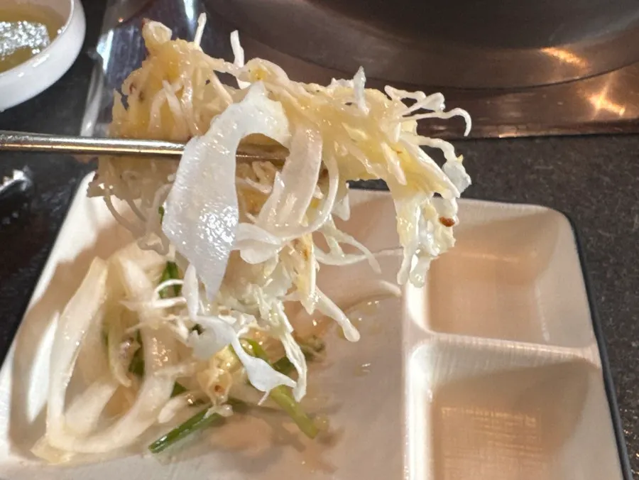 A plate of salad eaten before the meat