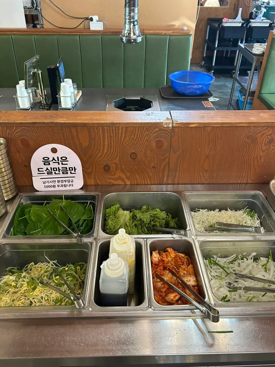 Plate of lettuce wraps and garlic