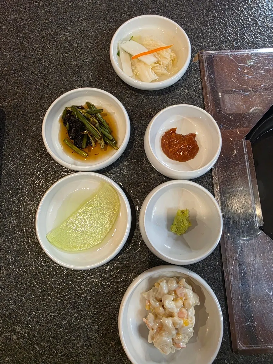 Packaged cuts including pork neck, belly, and front leg