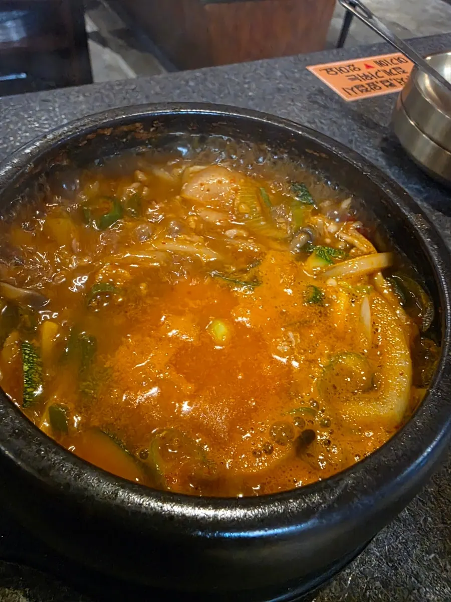 Mul-kimchi side dish eaten alongside the meat