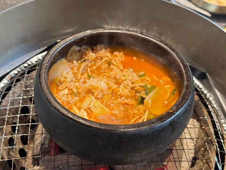 Doenjang stew simmered on the charcoal grill
