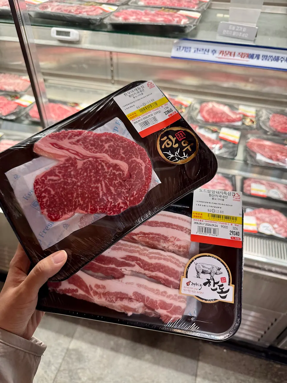 Meat grilling over charcoal with basic side dishes