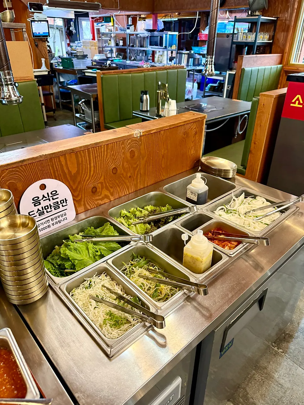 Self-serve drinks corner and side dish counter