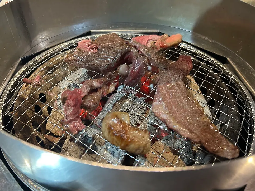 1++ hanwoo rib eye grilled over charcoal