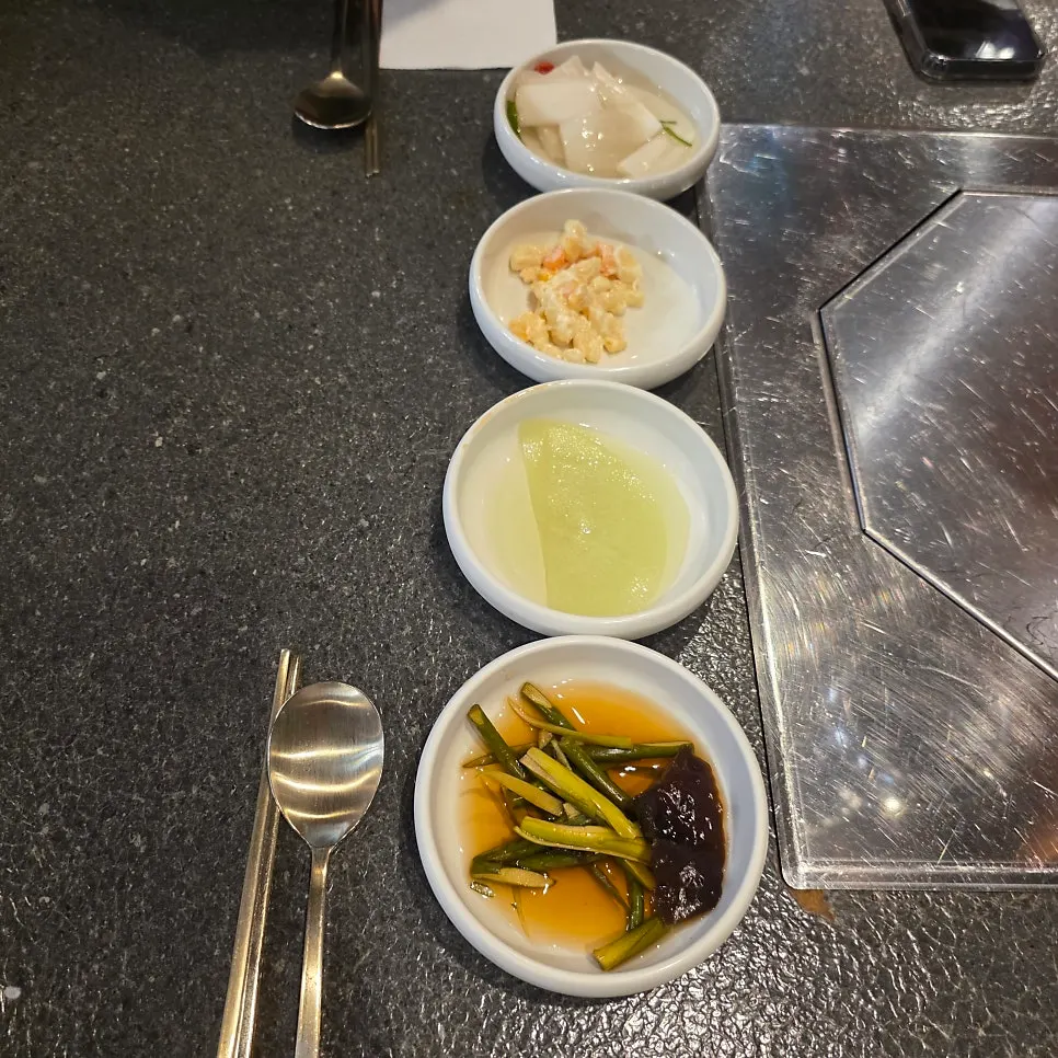 Plates of basic side dishes served with the meat