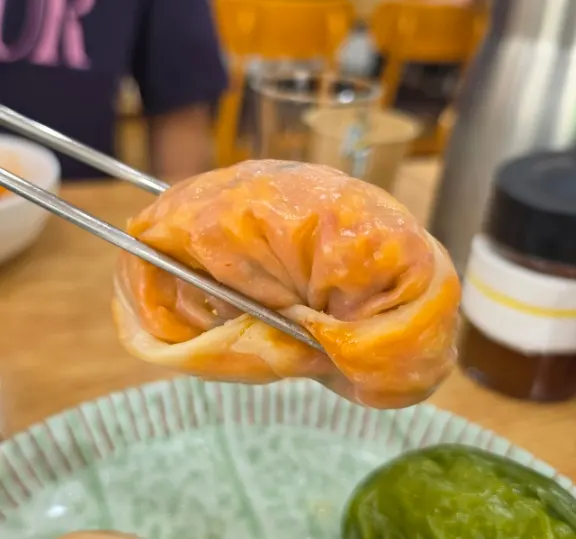 Seafood kalguksu paired with meat dumplings