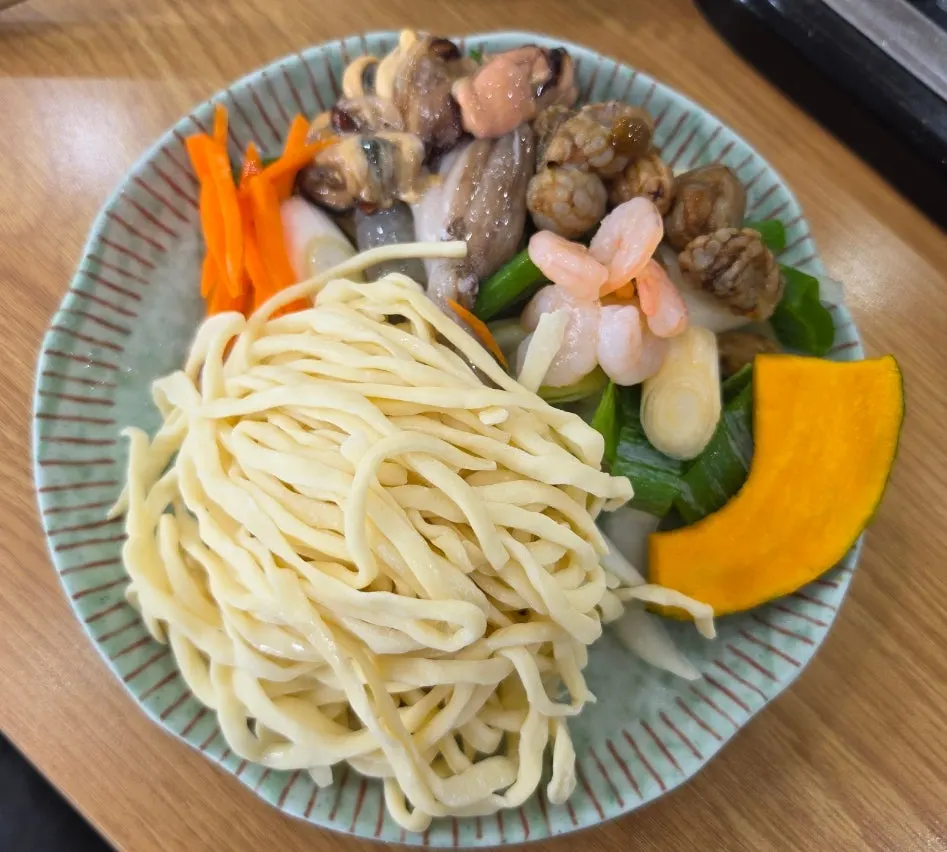 One serving of seafood kalguksu