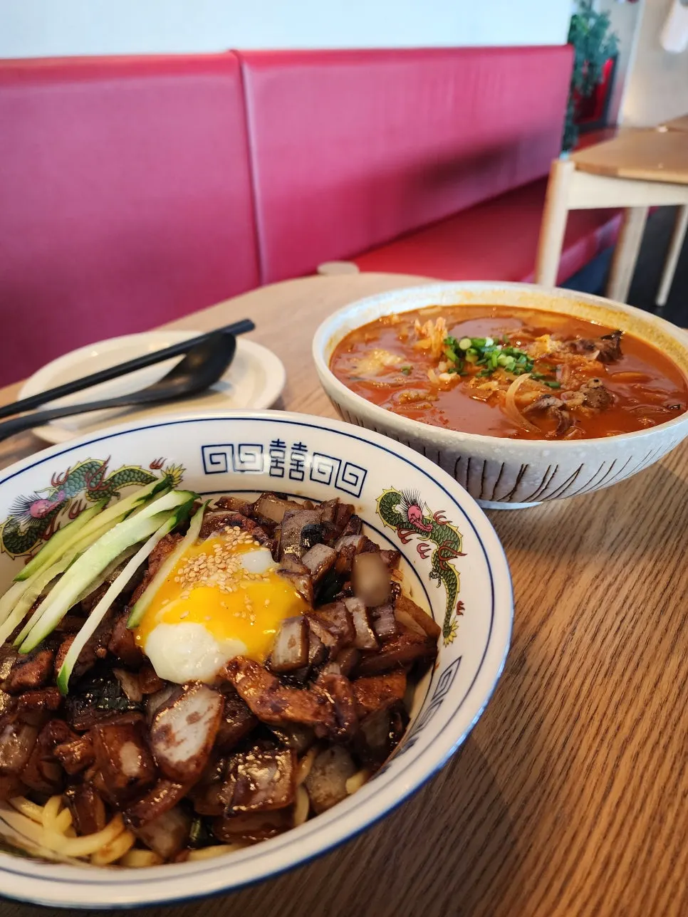 Ganjajang noodles topped with a poached egg and sauce
