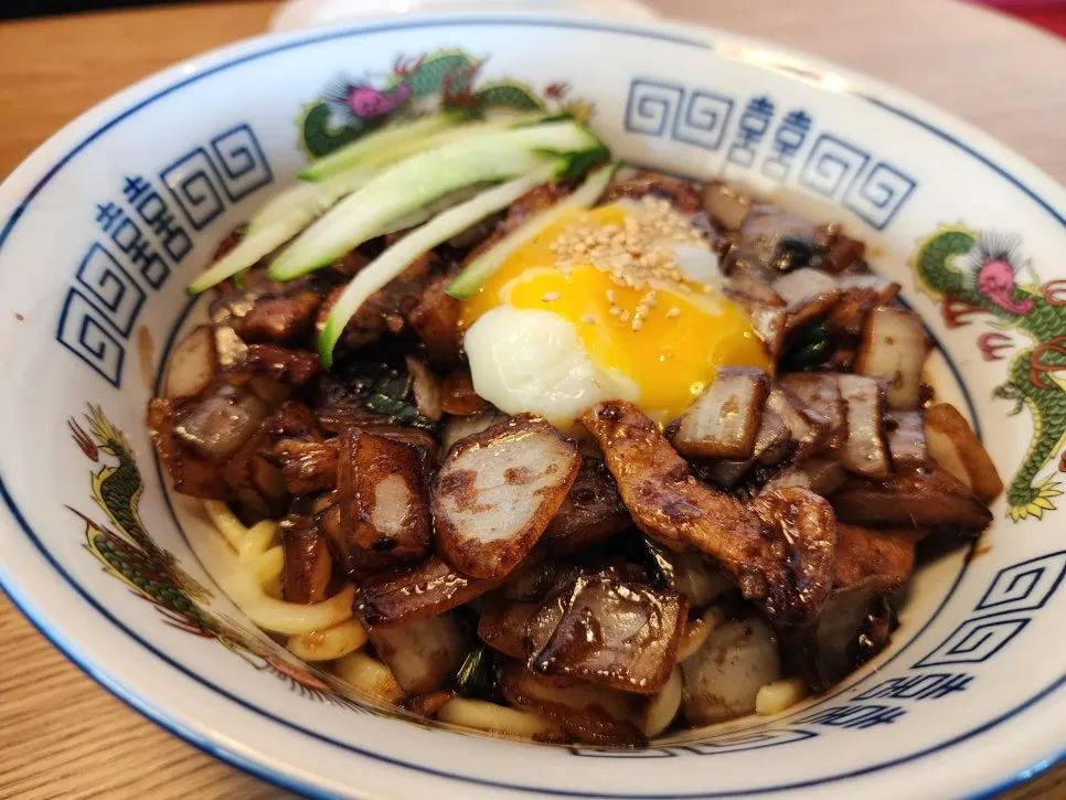 Glossy ganjajang sauce with large chunks of meat