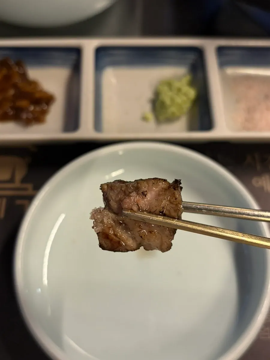 Grilled meat served with salt and wasabi