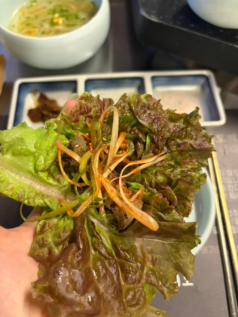 Pork belly wrapped in lettuce