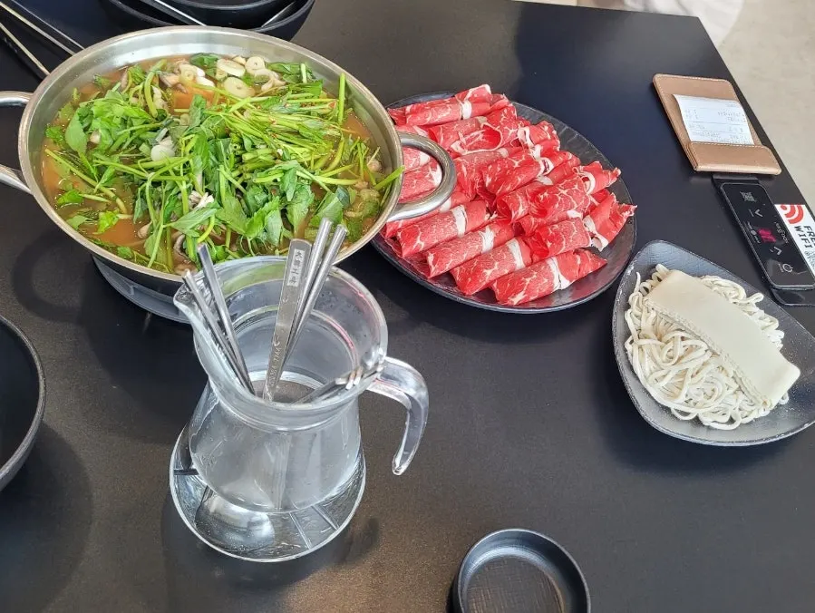 Close-up of the regular-spice red broth