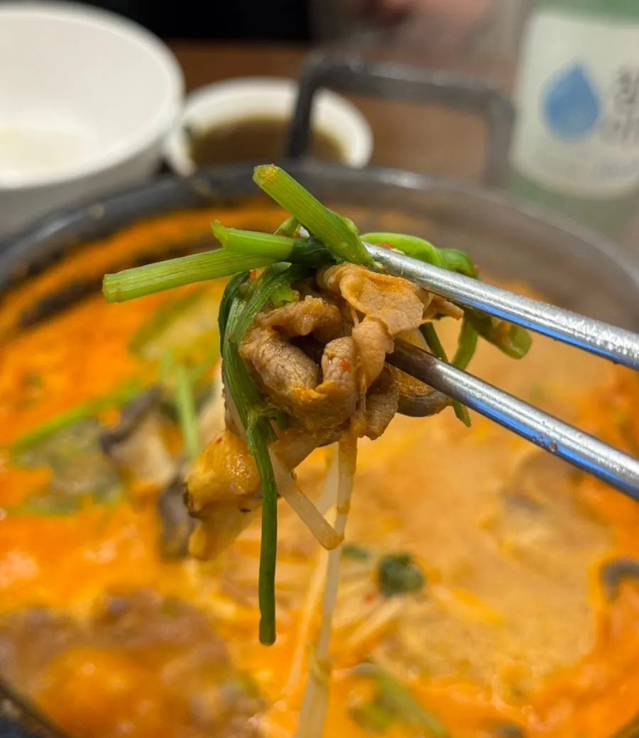 Blanched beef and minari dipped in soy sauce