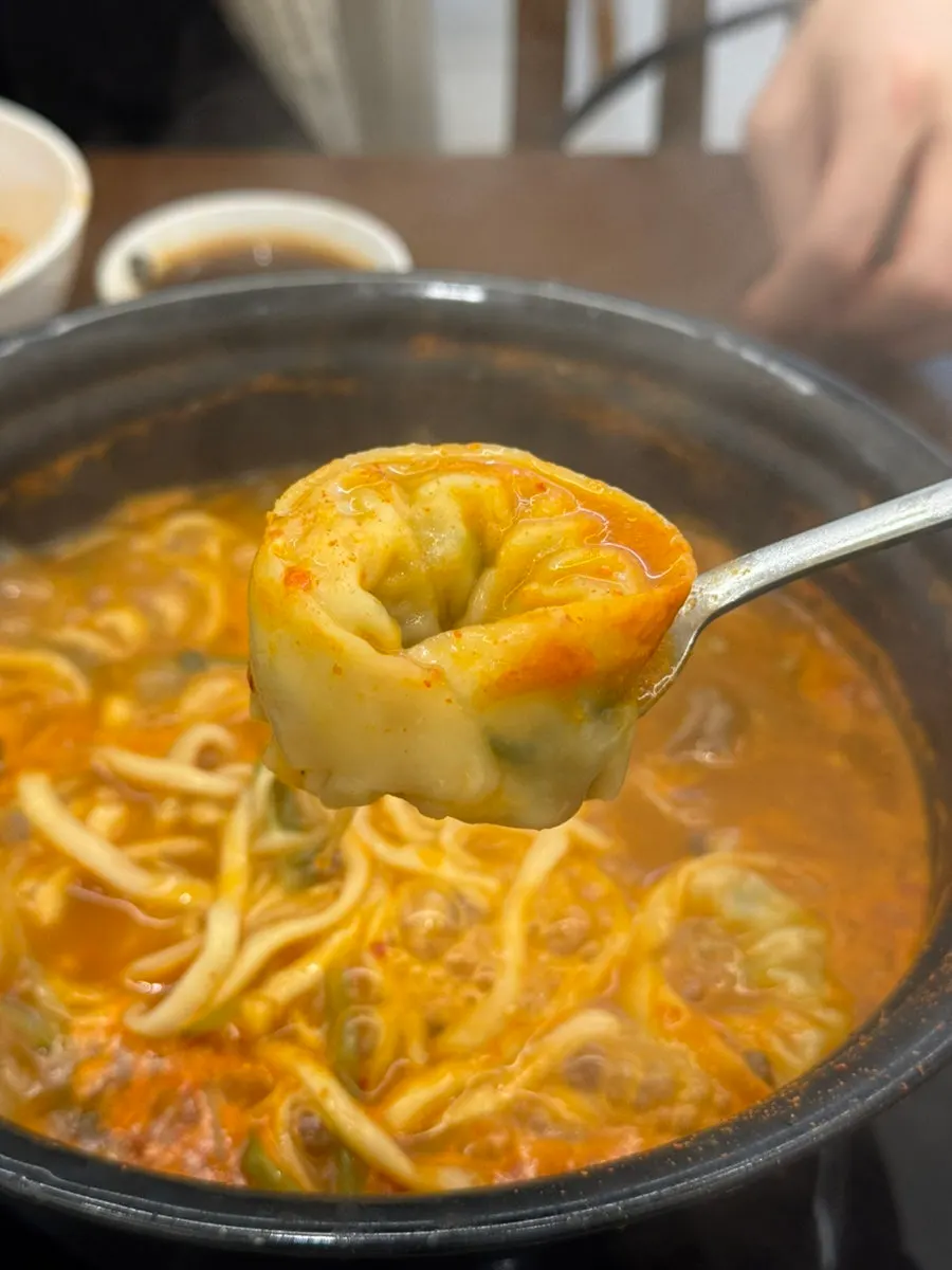 Dumplings served alongside the kalguksu