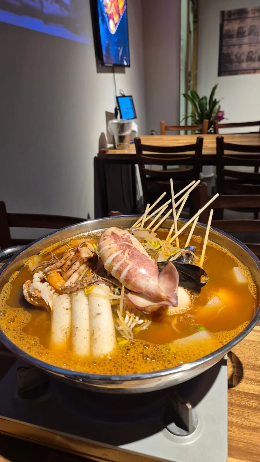 Fish cake stew with seafood and rice cake skewers