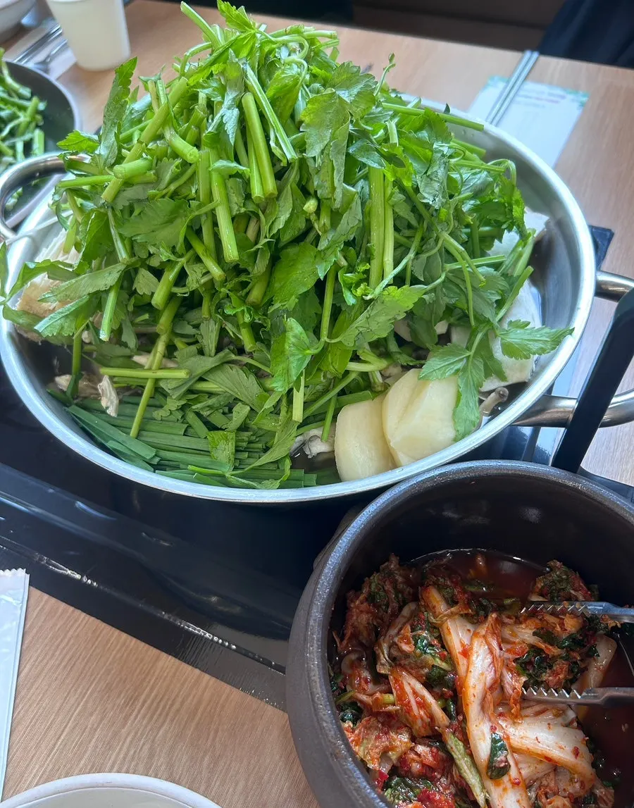 Assorted vegetables including minari and bok choy