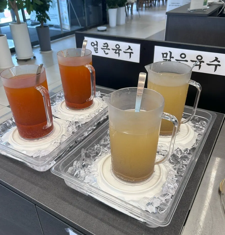 Self-serve broth and sauce corner