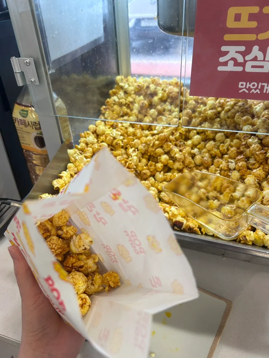Self-serve popcorn and old-school snacks corner