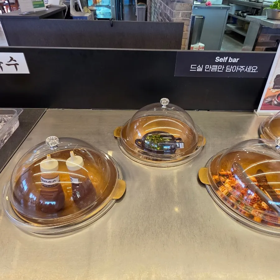 Sauce and side-dish corner at the self-bar