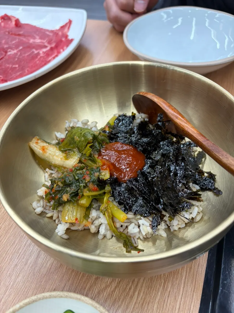 Table set with two servings of shabu kalguksu