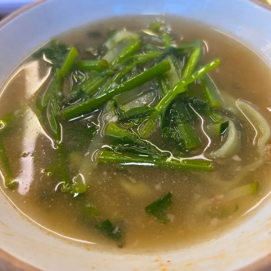 Pot of clear-broth shabu shabu simmering
