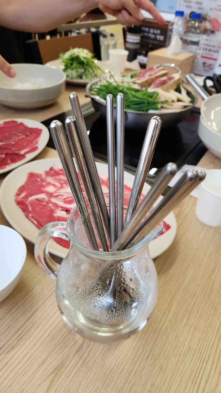 Shabu-shabu ingredients with added mushrooms and minari