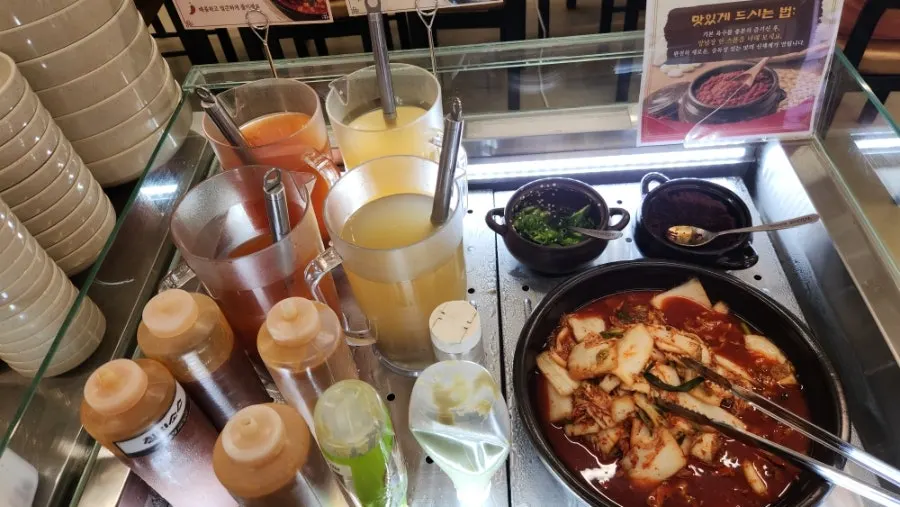 The self-serve bar with side plates, scissors, tongs, and wet wipes