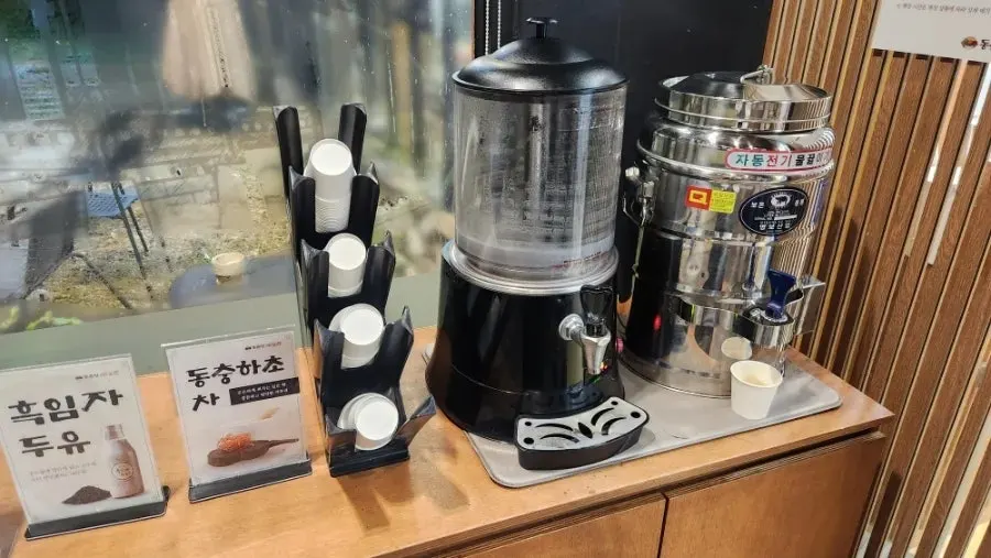 Black sesame soy milk and cordyceps tea grabbed after the meal
