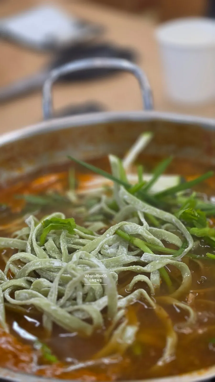 Meat and vegetables scooped from the shabu-shabu pot