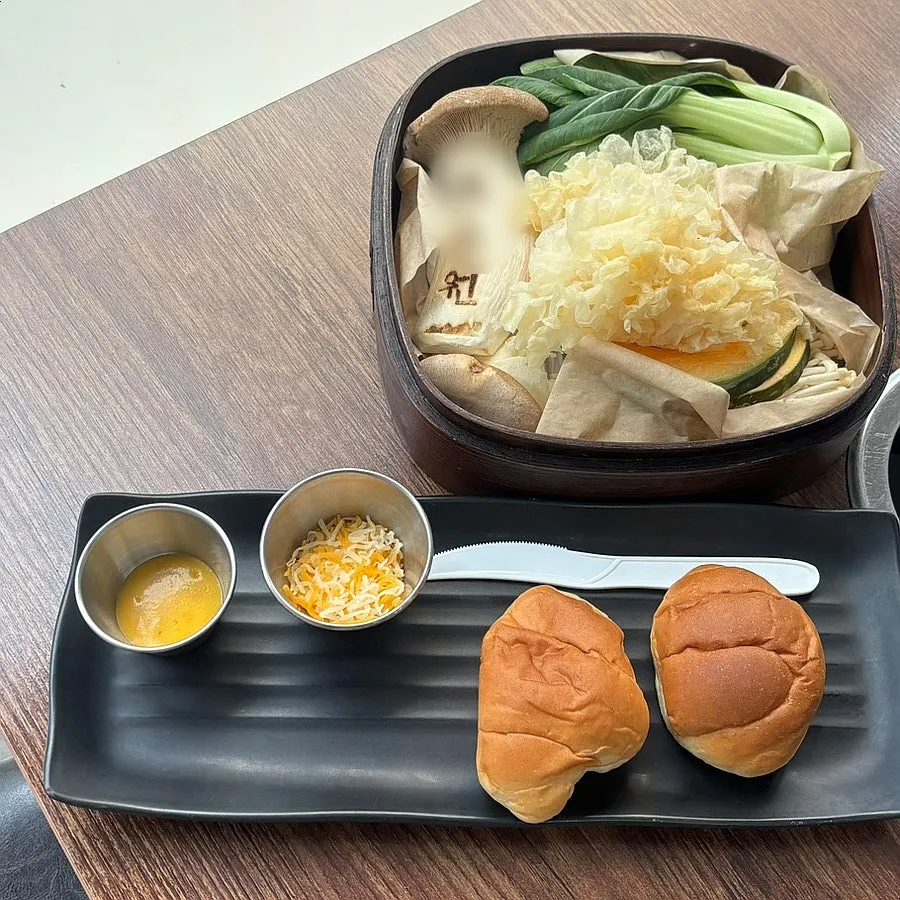 Vivid red Korean beef bulgogi served in a brass bowl
