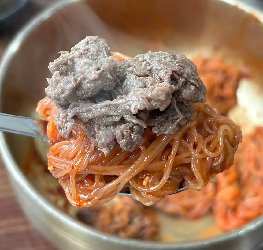 Bibim naengmyeon topped with sweet-and-spicy sauce