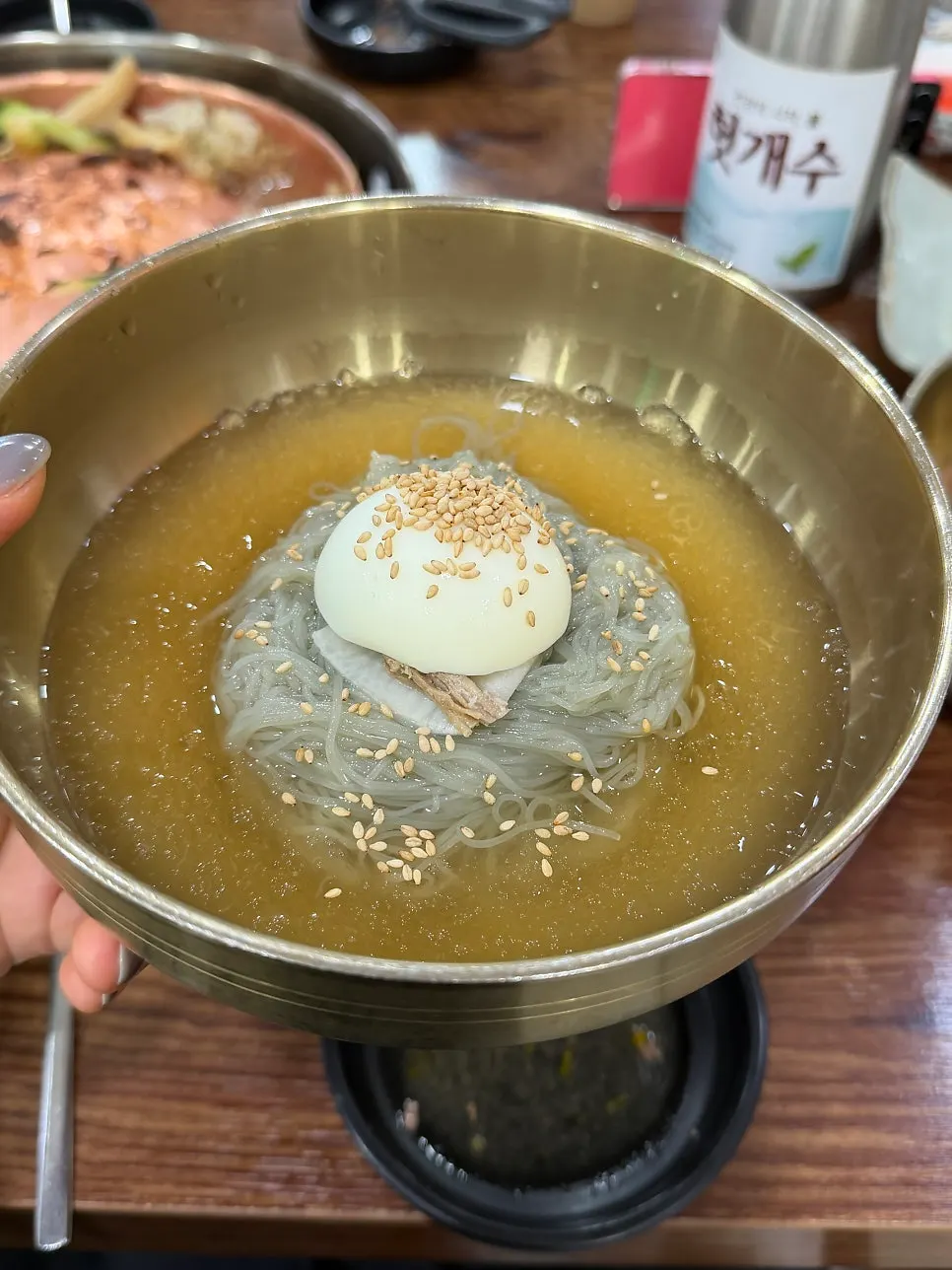 A bowl of dessert mul-naengmyeon