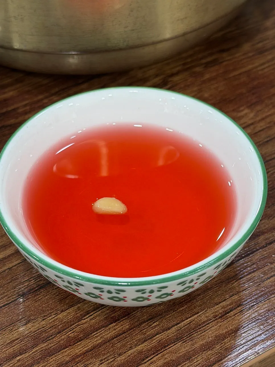 Icy naengmyeon broth served on the side