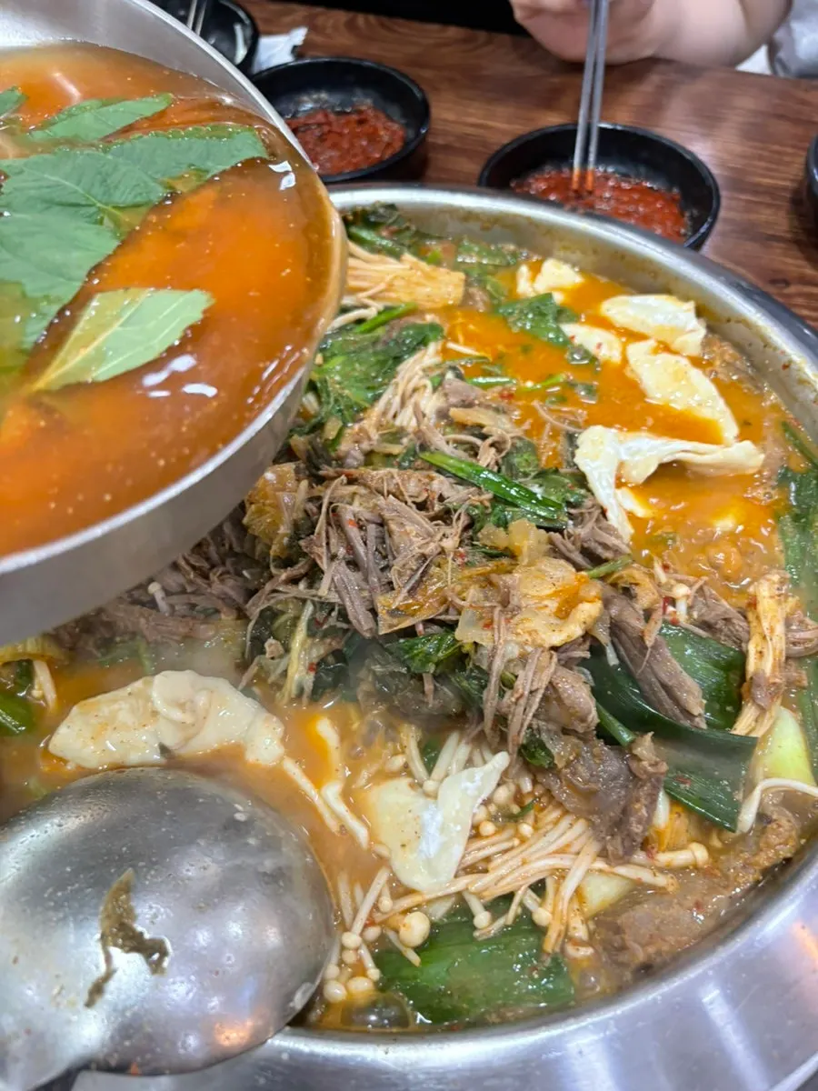 Extra hot pot broth served on the side