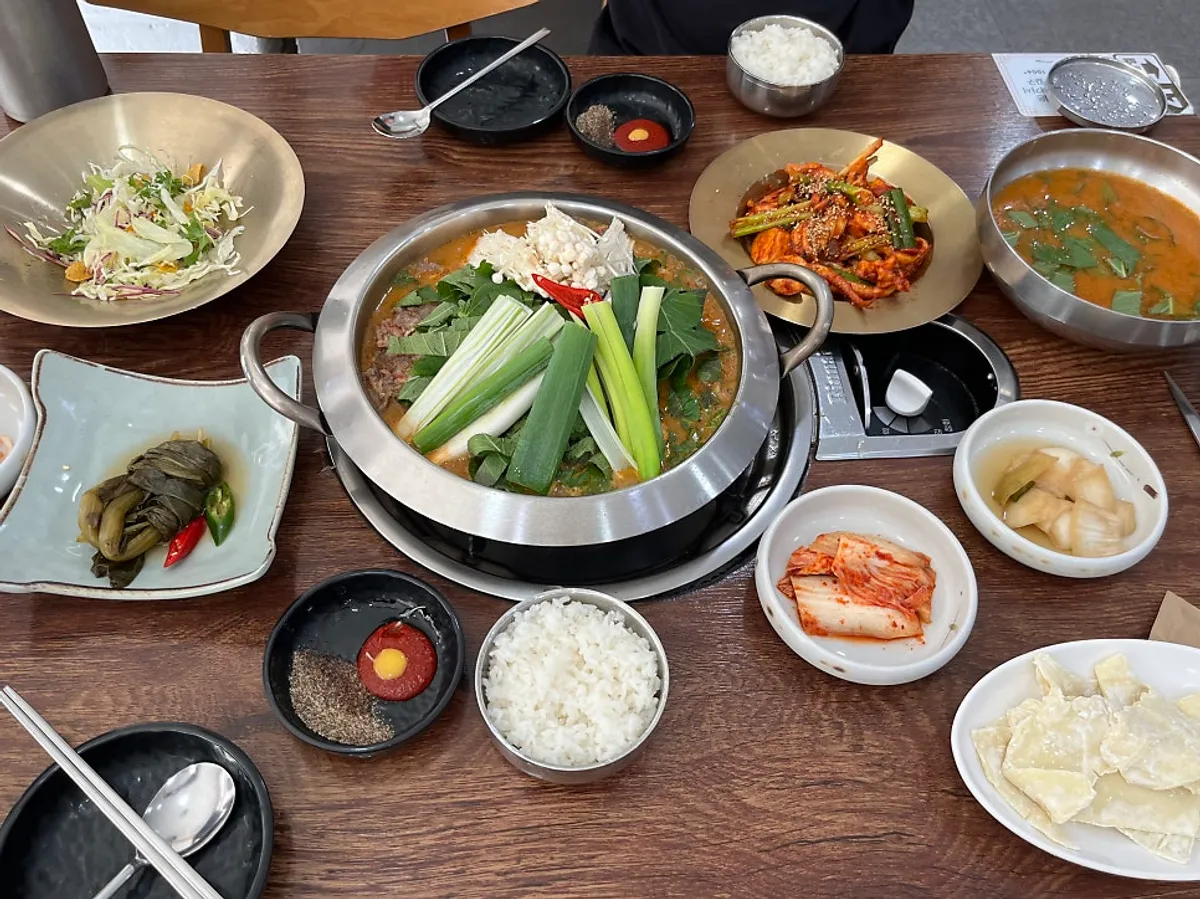 Table setting featuring Dongchuwon Bulgogi's Korean beef hot pot