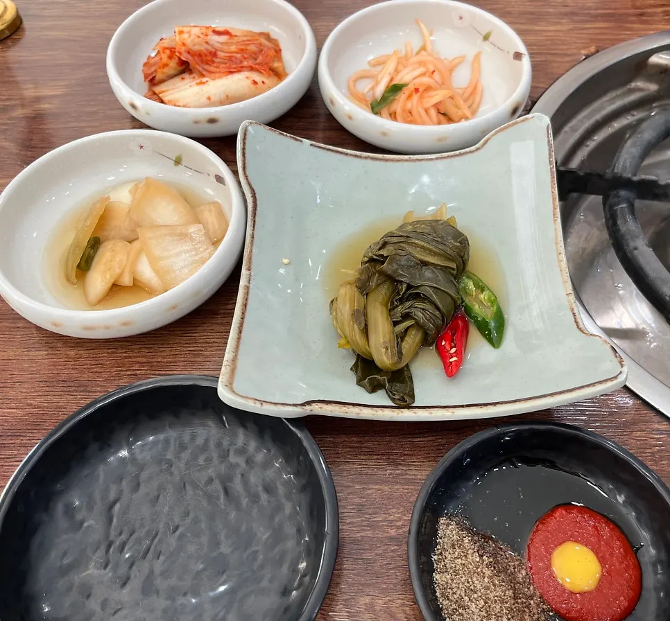 Neatly arranged side dishes and salad