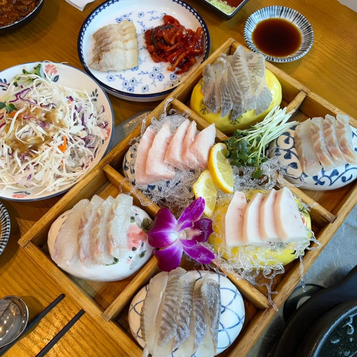 A full spread of basic banchan at Donghae Bada Hoetjip