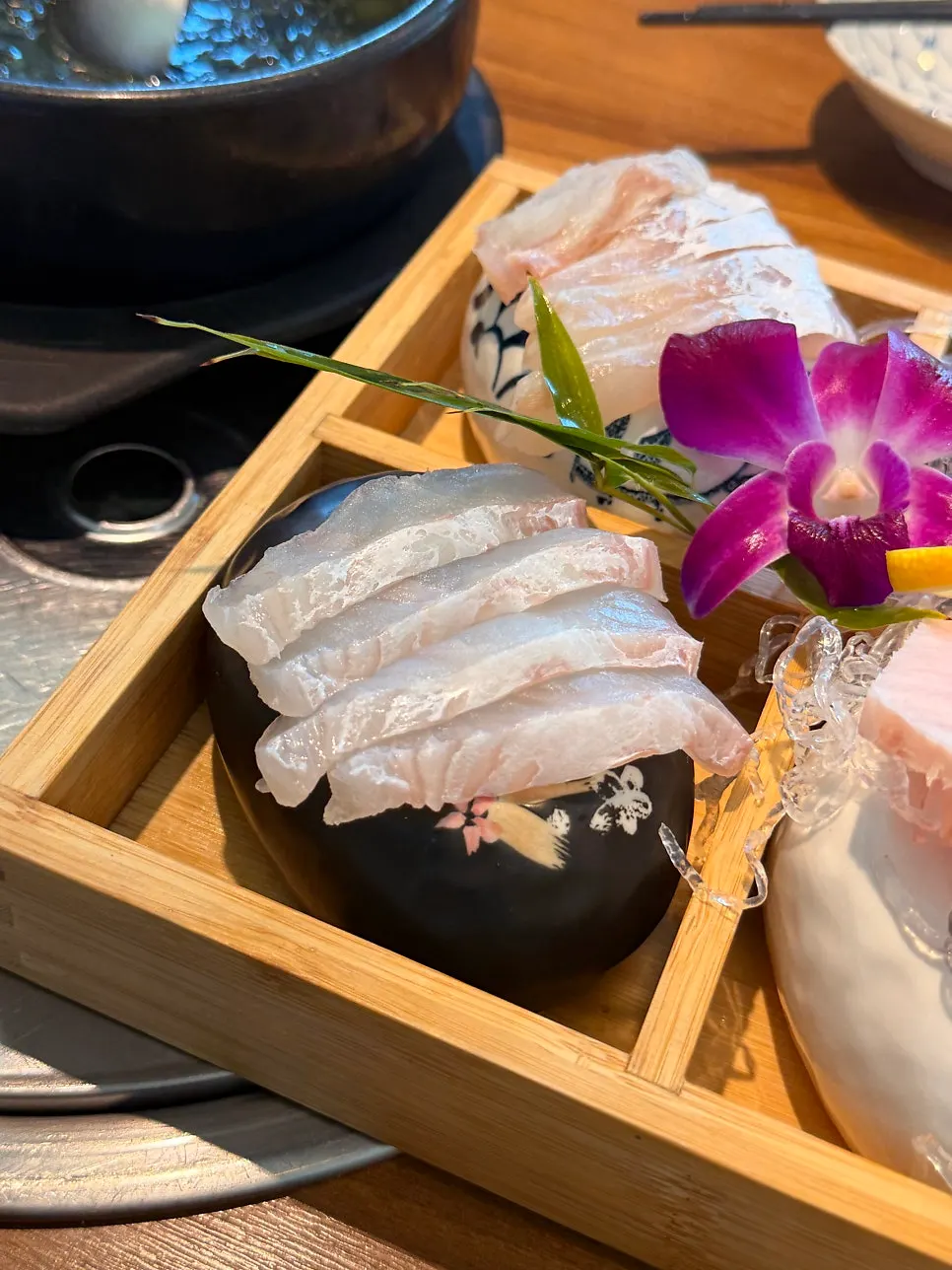 Sashimi plate garnished with radish sprouts