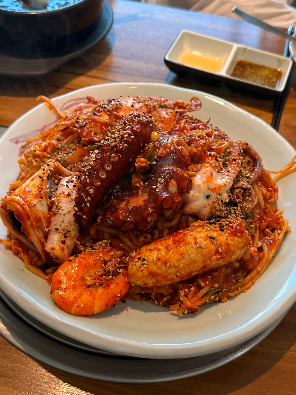 Seafood stew topped with octopus, shrimp and abalone