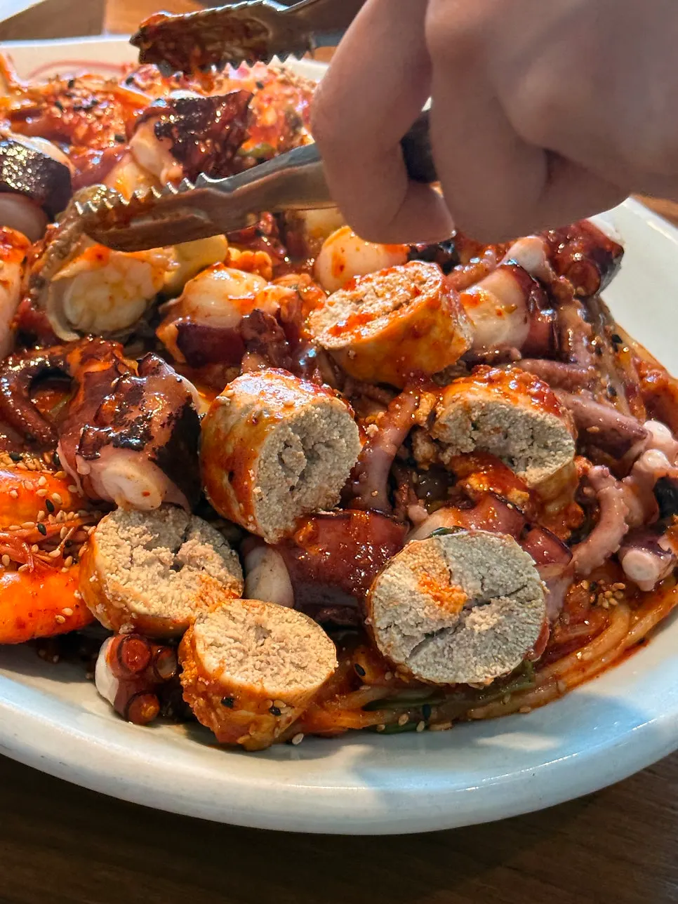 Seafood in the stew cut into bite-sized pieces